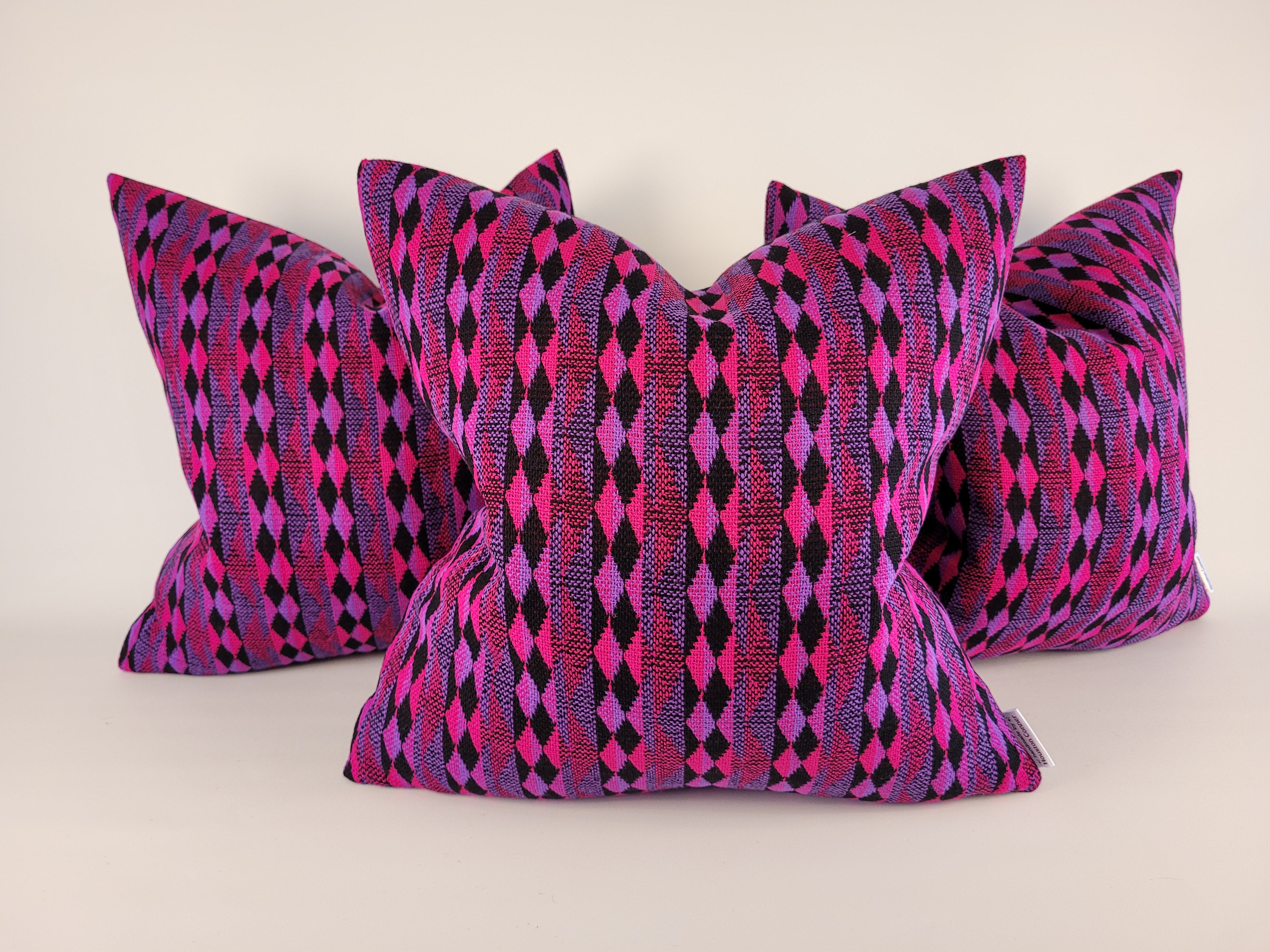 Pink purple throw discount pillows