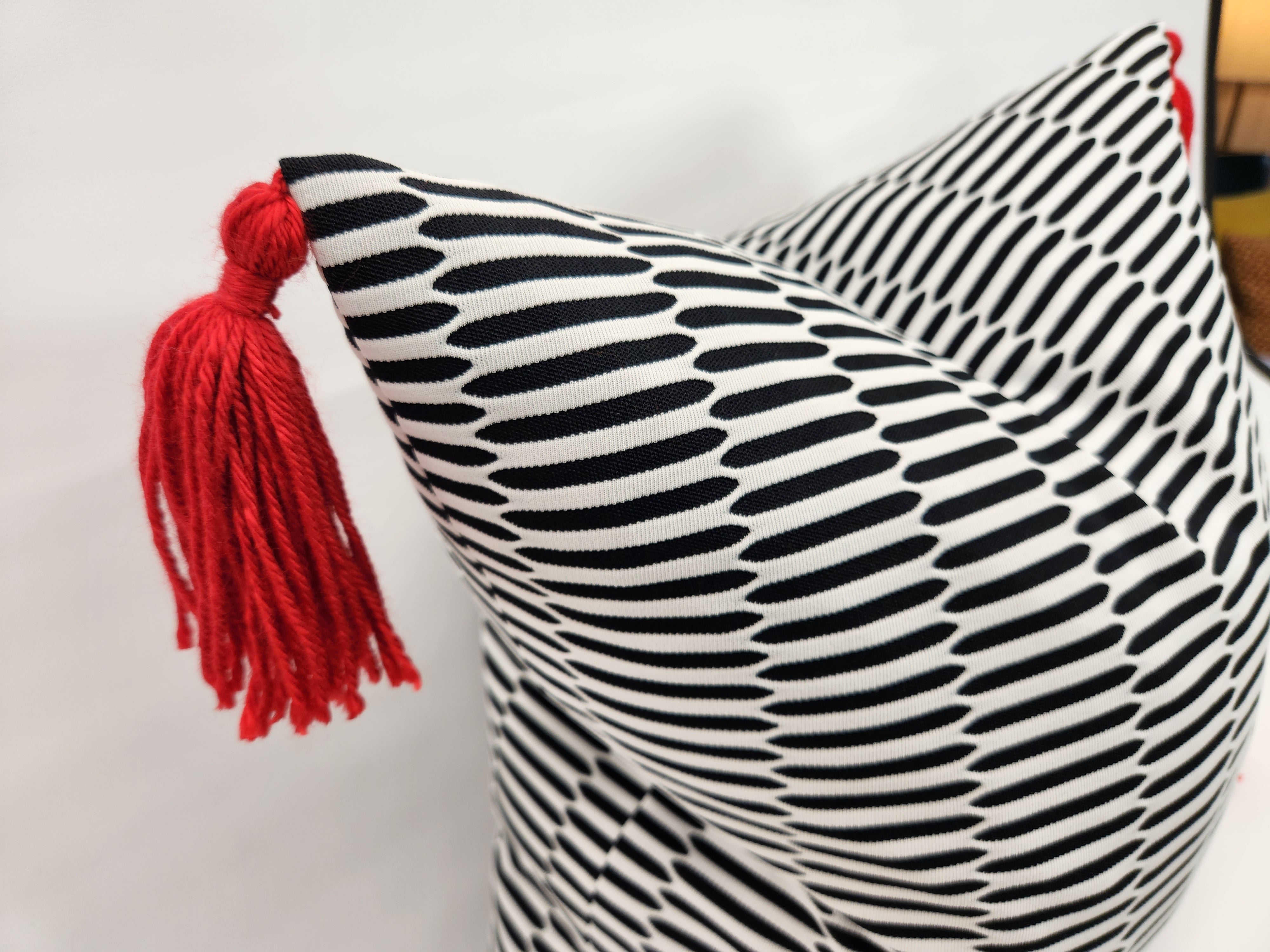 Red black and white throw online pillows